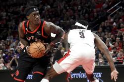 开云体育官方网站-猛龙主场胜利，巩固东部第一位置